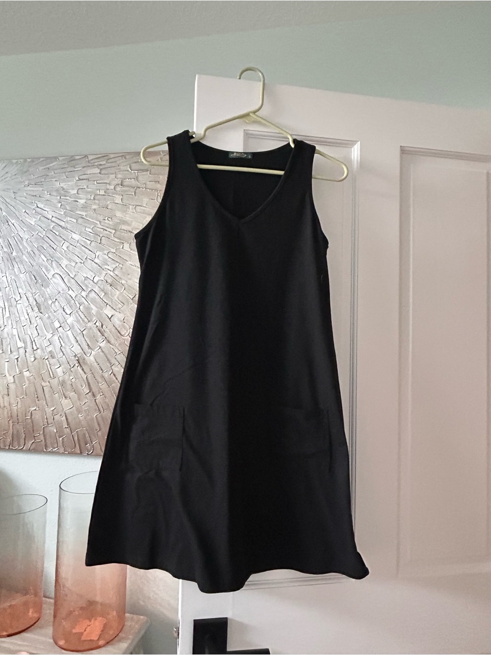 Sleeveless Black V-Neck Mini Dress with Pockets
